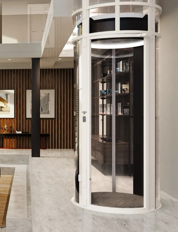 Round pneumatic vacuum elevator in a modern two story living room, no shaft or pit needed