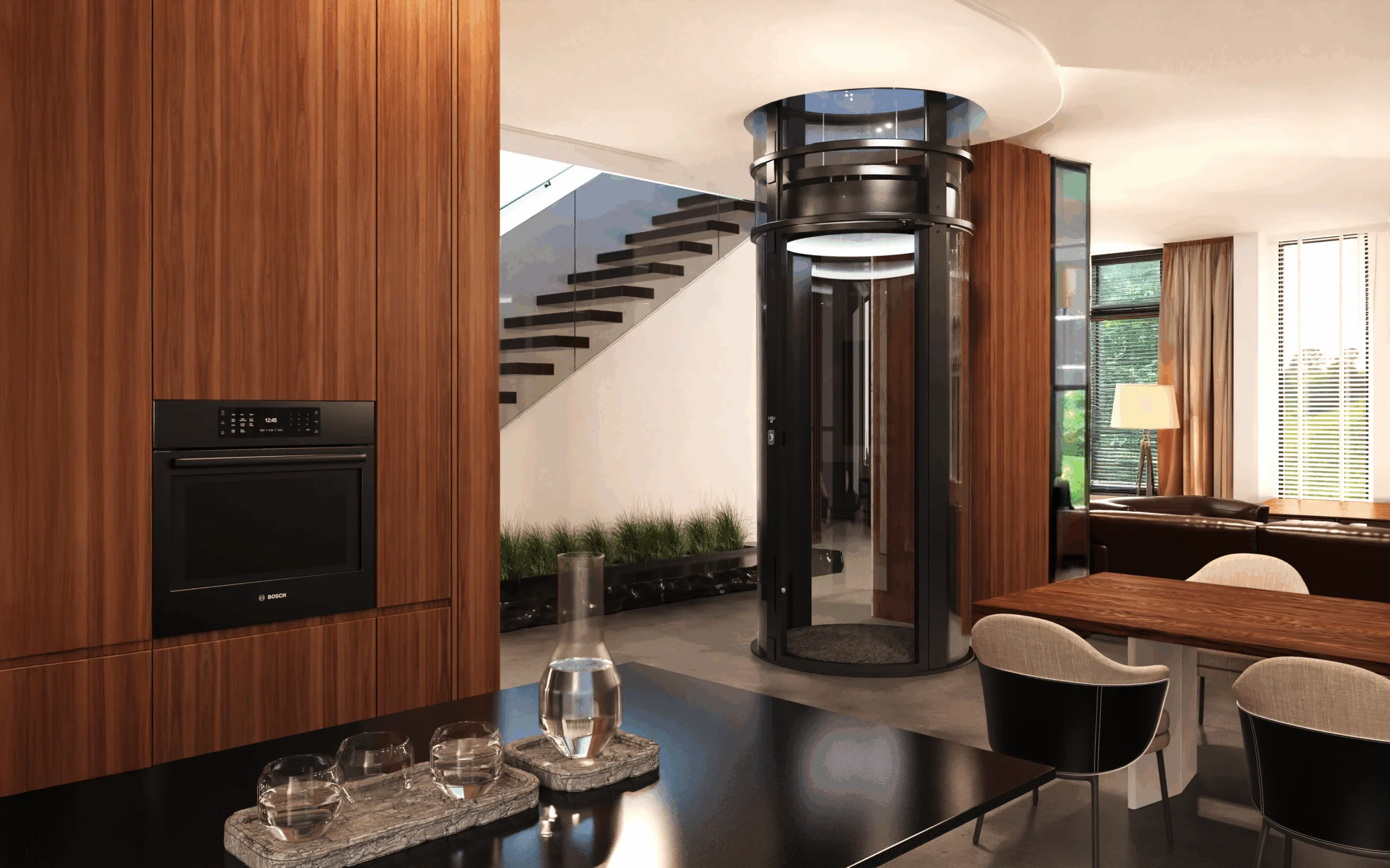 Round PVE home elevator with black frame installed in open living and dining area